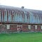 Cordwood barn along the Sturgeon River Road