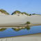 Small lake and hummocks amid dunes