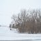 Snow covered farm.