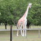 Giraffe sculpture N side of Highway 2