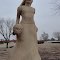 Elizabeth Polly,  Blue Light Lady, limestone sculpture by Pete   Felten, Hays, KS