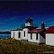 West Point Lighthouse under moonlight at Discovery Park