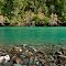 Green Smith River and Shore Rocks