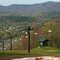 Ski Slope In Spring With Dogs