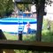 Dianna throwing her toys in the pool...