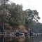 Limestone boulders extend into the river