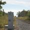 A CSX Transportation Mixed Freight Train with EMD SD70M No. 4683 approaches the Kingsford Circle Crossing at Mulberry, FL