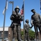 Protectors, Police Officer Firefighter Memorial, bronze of fireman with girl and boy looking up to police officer, Shawnee Safety Center, Shawnee,KS