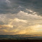 Storm clouds behind the Gallatin Valley and Spanish Peaks