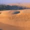 Marching sand.